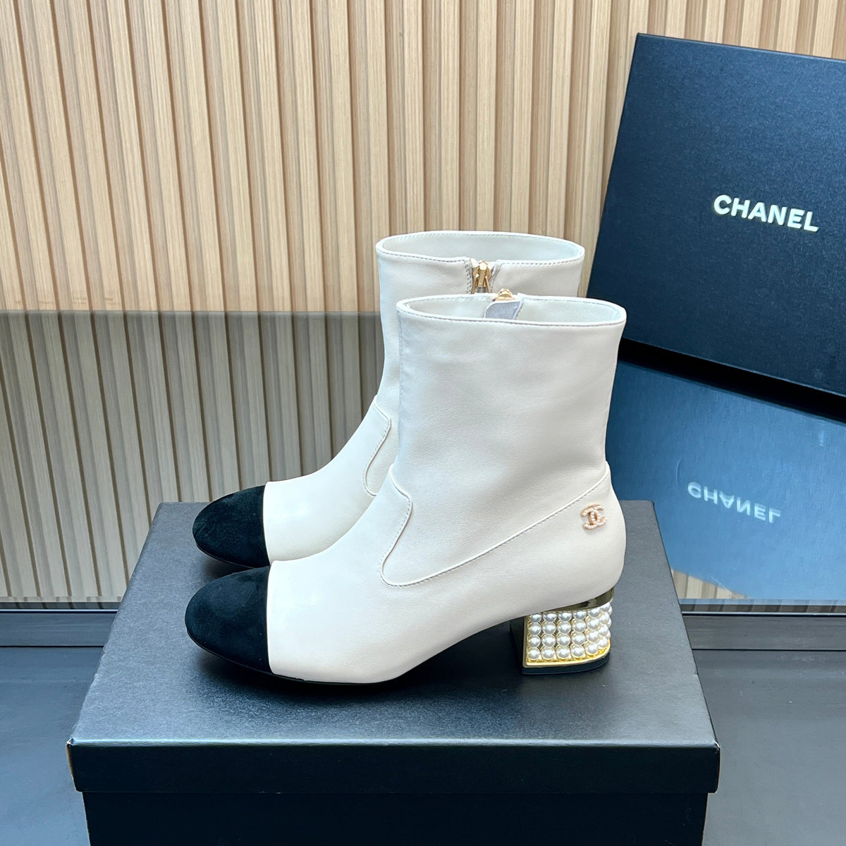 CHANEL 25S TALL BOOTS WITH PEARL DETAILS 50MM IN WHITE CALFSKIN AND BLACK SUEDE
