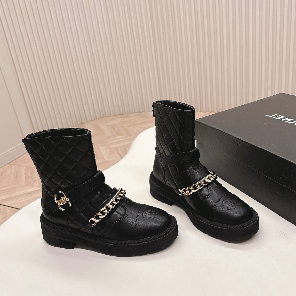 CHANEL ANKLE BOOTS 25S IN BLACK LAMBSKIN EMBOSSED LOGO WITH GOLD HARDWARE