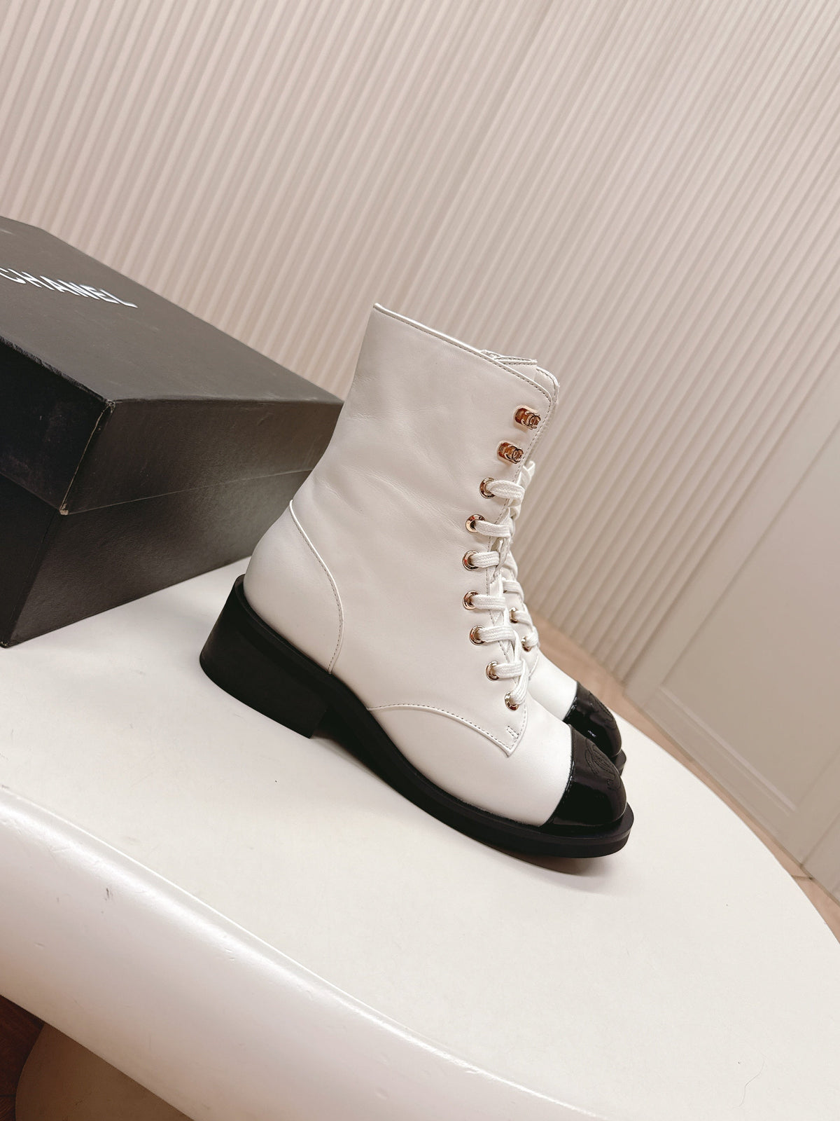 CHANEL ANKLE BOOTS 25S IN WHITE MIX BLACK LAMBSKIN WITH ZIPPER
