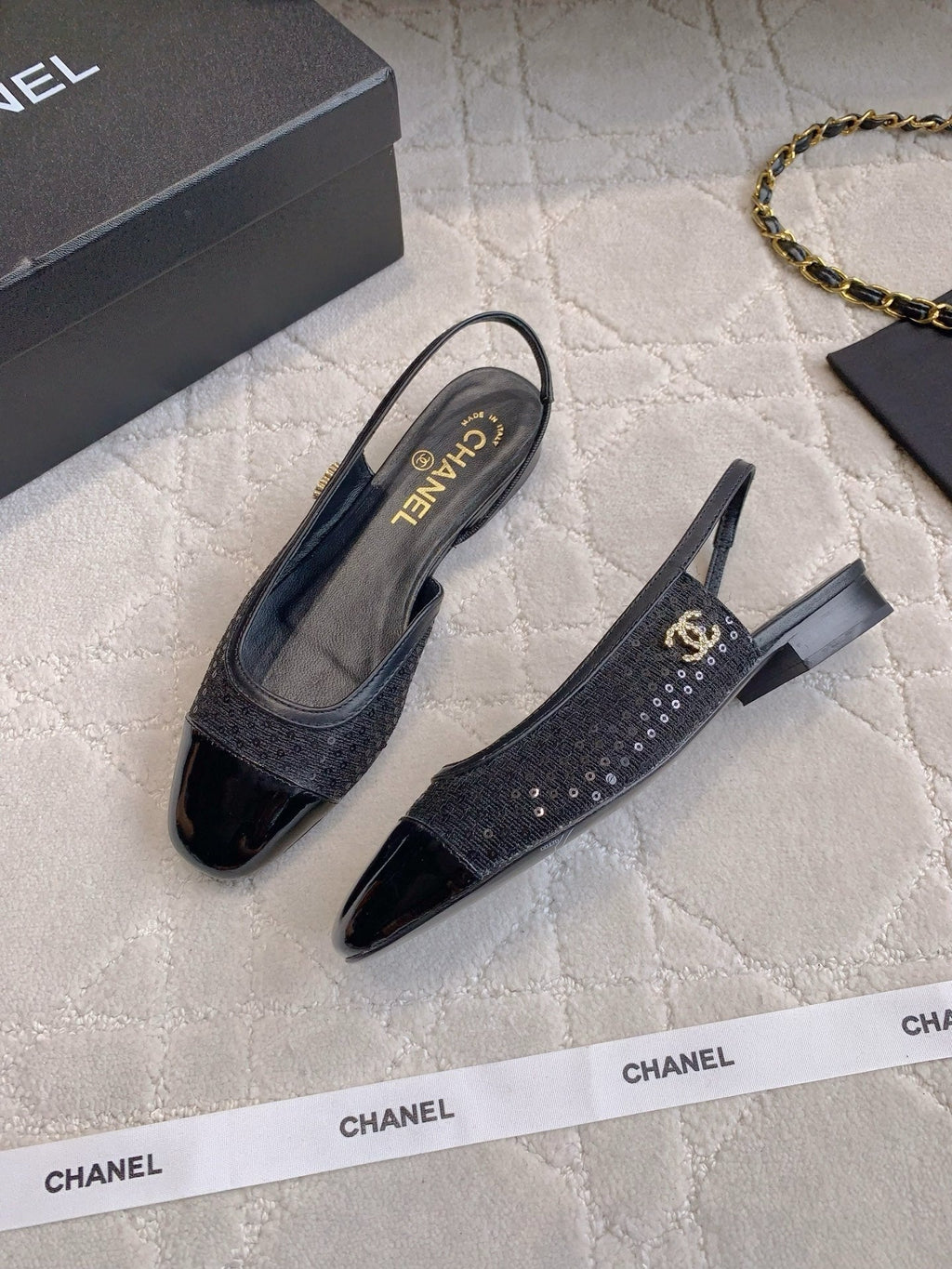 CHANEL 25S SLINGBACK IN SPARKLING BLACK CALFSKIN AND CANVAS GOLD HARDWARE