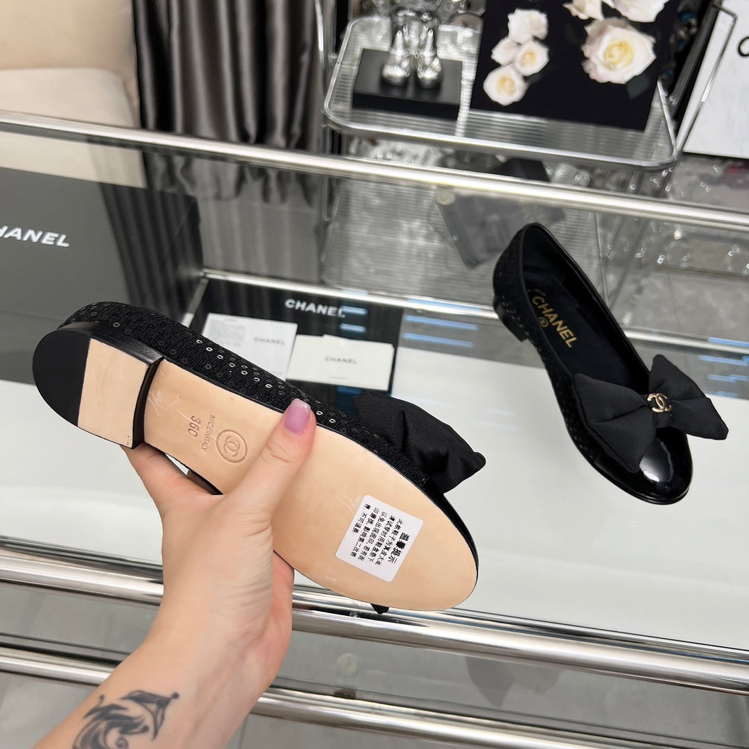 CHANEL 25S ROUND TOE BALLET FLATS WITH A BOW IN SPARKLING BLACK CANVAS