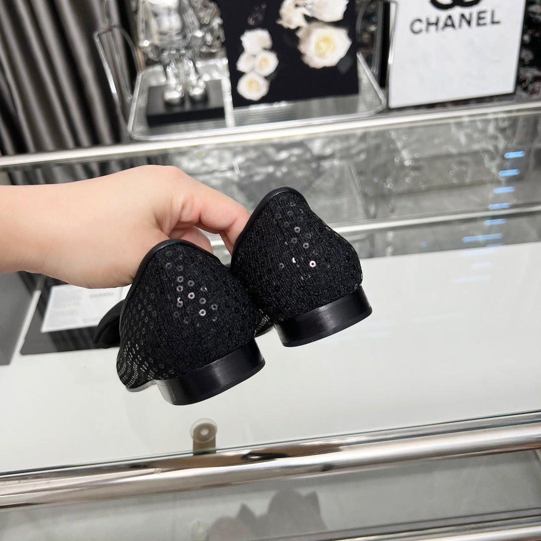 CHANEL 25S ROUND TOE BALLET FLATS WITH A BOW IN SPARKLING BLACK CANVAS