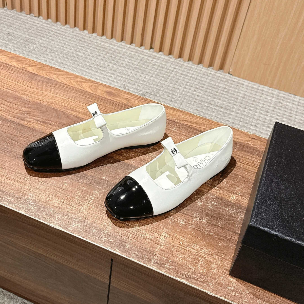 CHANEL 25S BALLET MARY JANES BLACK AND IVORY IN CALFSKIN